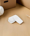 10Pk Self Adhesive Sneaker Heel Repair Patches on wooden table, breathable mesh liners for running shoe cushion pads.