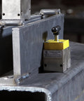 Magnetic Welding Square Base Clamp Holder With On Off Capabilities And Beefy 400 Pound Holding Force For Welding Kits And Fixturing in use on a metal surface.