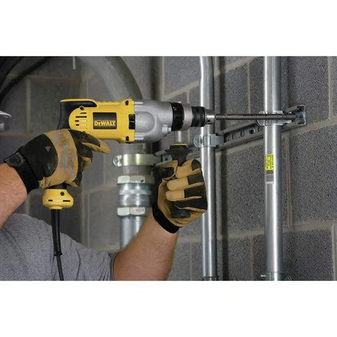 Beefy One Half Inch 10 Amp Hammer Drill With Pistol Grip And Dual Mode For Masonry Wood And Steel High Power Motor in use on wall
