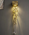 Top Shelf Crystal Wall Sconce Dropping That Killer Vintage Vibe You Want, Crafted To Serve Up A Flawlessly Diffused Glare Free Glow Throughout Bedrooms Hallways And Foyers Every Single Time, featuring a gold branch design with clear droplet.