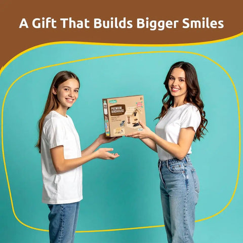 Two women holding a box of Premium Wooden Bird House Kit For Adults Build It Yourself Bird House And DIY Woodworking Project Family Friendly Craft Kit.