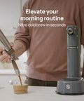 NitroPress Ds Electric Nitro Cold Brew Coffee Maker Machine Brewing Device, preparing creamy cold brew over glass.