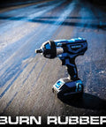 Cordless Impact Wrench Kit With Half Inch Drive Monster Torque 20V Lithium Battery displayed on asphalt.