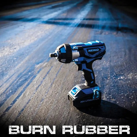 Cordless Impact Wrench Kit With Half Inch Drive Monster Torque 20V Lithium Battery displayed on asphalt.