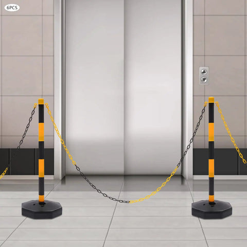 Hardcore 6 Pack Safety Bollards With Fillable Base And Interlocking Chains High Visibility Yellow Black Plastic Traffic Posts For Driveways Lots And Warehouse Zones Built Tough Us Stock set up near an elevator with linked chains.