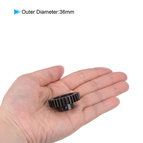 Person holding Mod 1 34T Pinion Gear with 8mm bore, 36mm outer diameter, hardened steel for RC cars and trucks.