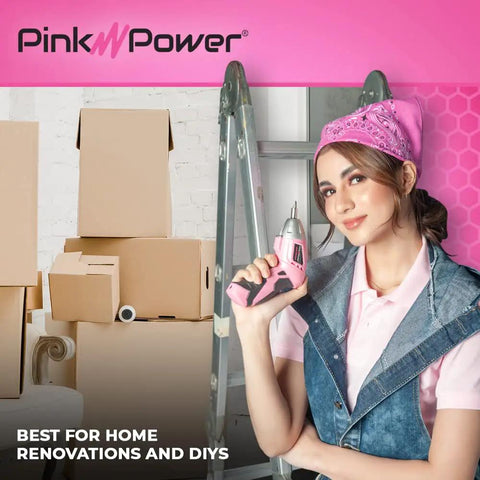 Woman holding pink cordless screwdriver kit in pink with 3.6V rechargeable battery, LED light, next to moving boxes and ladder
