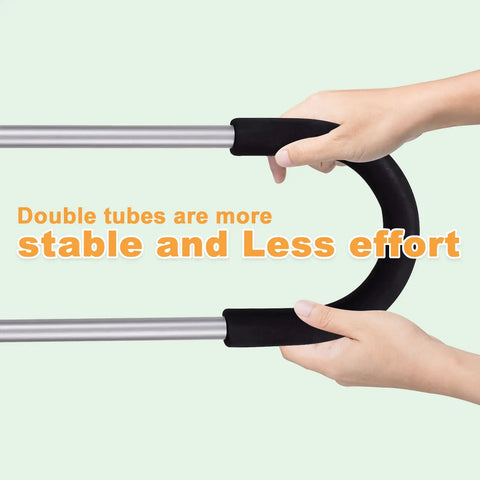 Hands holding the Kids Bicycle Safety Trainer Push Bar Handle for Balance and Confidence in gray with double tubes for stability.
