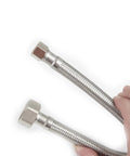 Close-up of 16-Inch Toilet Water Supply Line With Three Eighths Inch Compression To Seven Eighths Inch Ballcock Brass Nut, SUS304 Stainless Steel Braided Hose, Built To Last Inlet Connector With Anti-Leak EPDM Gasket, FL003-16 held by hand