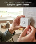 Person installing motion sensor on wall; part of the Motion Sensor Bundle With Two White A19 LED Bulbs For Smart Home Lighting Hands Free Activation