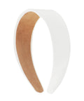 Slay Your Daily Hair Game With This Super Comfy Two Inch White Vegan Leather Headband For Women featuring smooth surface and soft inner lining.