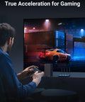 Person playing a racing video game on a large screen, emphasizing true acceleration for gaming with a racing car displayed.