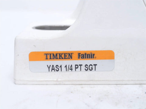 Close-up of Timken Fafnir YAS1 1/4 PT SGT label on Wide Inner Ring Housed Ball Bearing Unit For Industrial Equipment Heavy Duty Sealed Housing With AAM AG Compatibility Easy Install High Load Capacity Precision Industrial Bearing Assembly For Motors And Machinery.