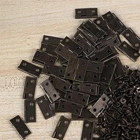 Beefy Heavy Duty Self Closing Spring Hinges For Jewelry Boxes with screws, stainless steel hinges for craft boxes, 50 piece pack on wood surface