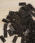Built To Last Heavy Duty Self Closing Metal Hinge Set For Cabinets And Jewelry Boxes 50 Pieces visible on wooden surface