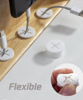 Close-up of Eight Pack Three Quarter Inch Cable Cord Grommets in white silicone, showing flexible openings for desk wire management.