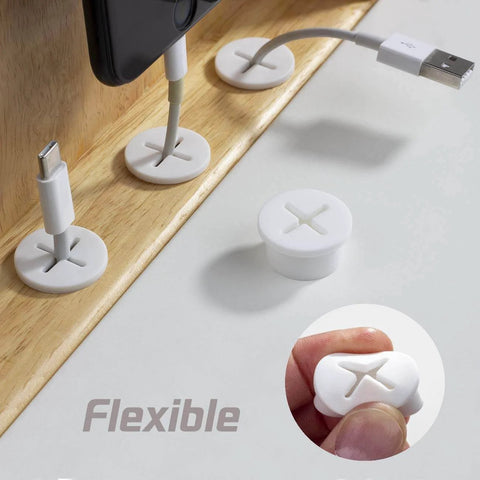 Close-up of Eight Pack Three Quarter Inch Cable Cord Grommets in white silicone, showing flexible openings for desk wire management.