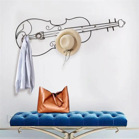 Modern Wall Mount Coat Hooks Dang Handy Entryway Storage Rack Easily Hangs Coats Jackets And Keys With Heavy Duty Steel Frame Built For Everyday Grind At Home featuring a stylish violin design with a jacket and hat.