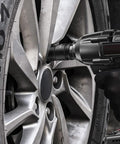 1 Inch Drive Deep Impact Socket Set in action on car wheel, demonstrating heavy-duty use with power tool