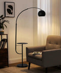 Black Floor Lamp With Marble Table Base 79 Inch Modern Industrial Arc Lamp next to armchair in cozy living room