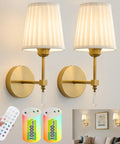Gold Cordless Wall Sconces Set Of Two Battery Operated Rechargeable Dimmable Led Lamps With Fabric Shades Totally Wireless Home Lighting mounted on wall.