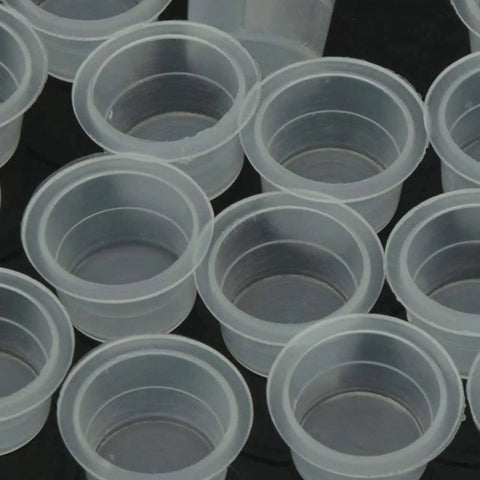 Close-up of Large Tattoo Ink Cups 500 Pack Plastic Pigment Cups Size 15 Disposable Microblading Cups for supplies bulk set