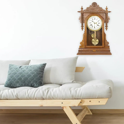 Metal Clock Pendulum Replacement Part 8.26 x 3.54 Inch in wall-mounted clock beside cream sofa with green pillow