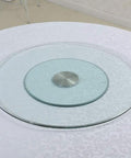 Tempered Glass Lazy Susan Turntable Plate With Aluminum Bearing Heavy Duty Round Serving Tray on a white tablecloth