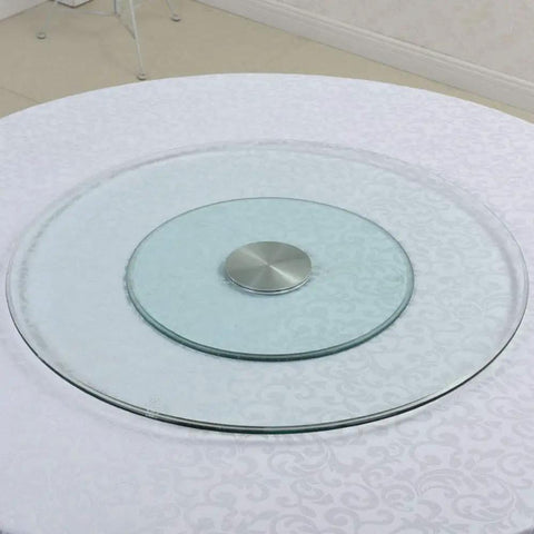 Tempered Glass Lazy Susan Turntable Plate With Aluminum Bearing Heavy Duty Round Serving Tray on a white tablecloth