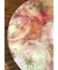 Close-up of a 15 Inch Rustic Farmhouse Round Wooden Lazy Susan Centerpiece with pink and green floral design