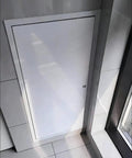 Heavy Duty Wall Access Panel For Drywall Plumbing Inspection Door Flush Mount Aluminum Hvac Service Hatch Straight Up Built Tough With Clean Cut Look Quick Flip Indoor 24X60 mounted in corner of tiled wall.