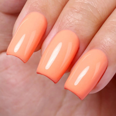 Close-up of nails polished with Coral Orange Gel Nail Polish 10ml HEMA Free UV LED Cure Soak Off Long Lasting Summer Formula