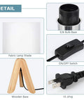 Details of Cozy Kids Table Lamp With Fabric Shade And Wood Tripod Base, showing UL plug, E26 bulb base, and switch.
