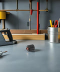 Upgrade Your Setup With Fast Start Plasma Cutter Cartridge Consumables on a workshop table, designed for heavy duty welding.