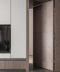 Built Tough Invisible Hydraulic Hinge Set on a modern hidden door, showcasing sleek design and smooth finish.