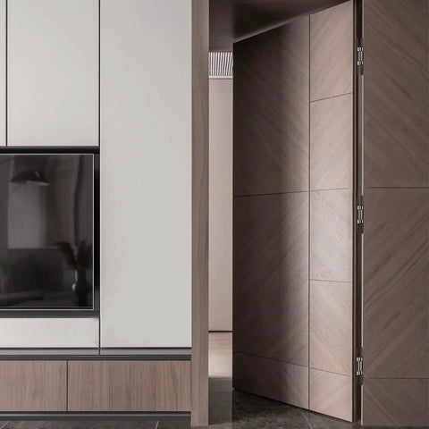 Built Tough Invisible Hydraulic Hinge Set on a modern hidden door, showcasing sleek design and smooth finish.