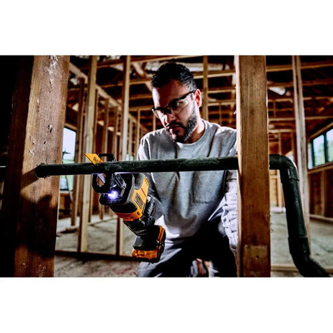 Person using Atomic 20V Max One-Handed Cordless Reciprocating Saw Tool Only With Brushless Motor in construction site