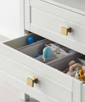 Champagne Bronze Cabinet Knobs Set 10 Pack 1.2 Inch 30mm Single Hole Drawer Knobs installed on a white cabinet ZH0008