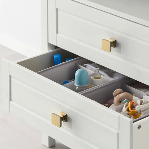 Champagne Bronze Cabinet Knobs Set 10 Pack 1.2 Inch 30mm Single Hole Drawer Knobs installed on a white cabinet ZH0008