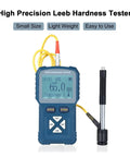 Hella Accurate Digital Leeb Hardness Tester For Metal Workpieces With Swift Multi Value Readings Fast Data Logging And Rock Solid Industrial Grade Construction display showing hardness reading on a stainless steel surface.