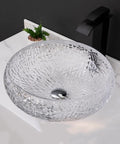 Top Notch Round Glass Vessel Sink Paired With A Sleek Waterfall Faucet Combo Solid Crystal Bathroom Vanity Bowl on white counter.