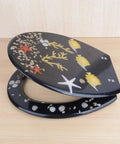 Top Shelf Black Resin Toilet Seat Universal Fit Easy Clean Bathroom Lid with decorative shells and starfish design