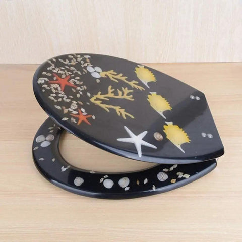 Top Shelf Black Resin Toilet Seat Universal Fit Easy Clean Bathroom Lid with decorative shells and starfish design