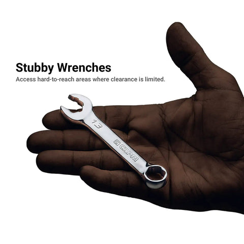 Person holding a single wrench from the WaveDrive Pro 20-Piece Stubby Combination Wrench Set For Metric And SAE Bolts in hand.