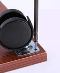 Double Wheel Nylon Casters For Furniture 1.5 To 2 Inch Wheels with screwdriver and screws on wooden surface
