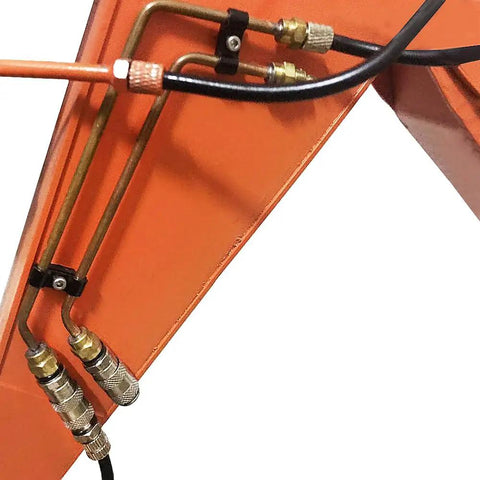 M5 4mm Quick Coupling Connector on orange metal part for RC hydraulic oil pump tank, showing durable construction for 1:14 scale cars.