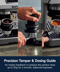 La Specialista Touch Espresso Machine With Grinder And Milk Frother showing dosing and tamping guide in use