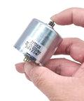 Heavy Duty 12V DC Motor ZYTD520-03C PM Replacement For 520-03B Engine in hand, showcasing smooth design and efficiency.