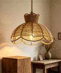 YNAHZAOK Hand-Woven Jute Rope Pendant Light Wrapped Iron Frame Hanging Lamp with Natural Hemp Rope Cord above wooden table.