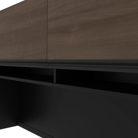 Close-up of the Badass L Shaped Standing Desk With Three Drawer Pedestal Scratch Resistant Laminate Top showing wood finish and black accents.
